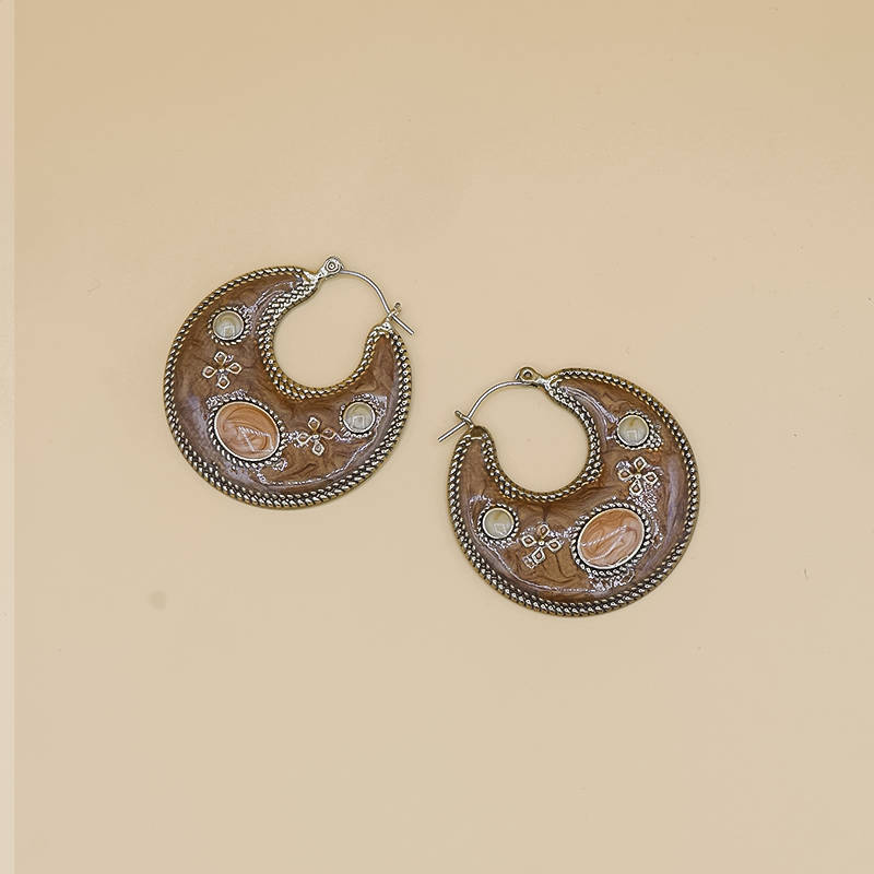 Vintage Hoop Earrings – Handcrafted hoop earrings with an intricately engraved centerpiece stone, fine beaded detailing, and a two-tone antique finish for a timeless look